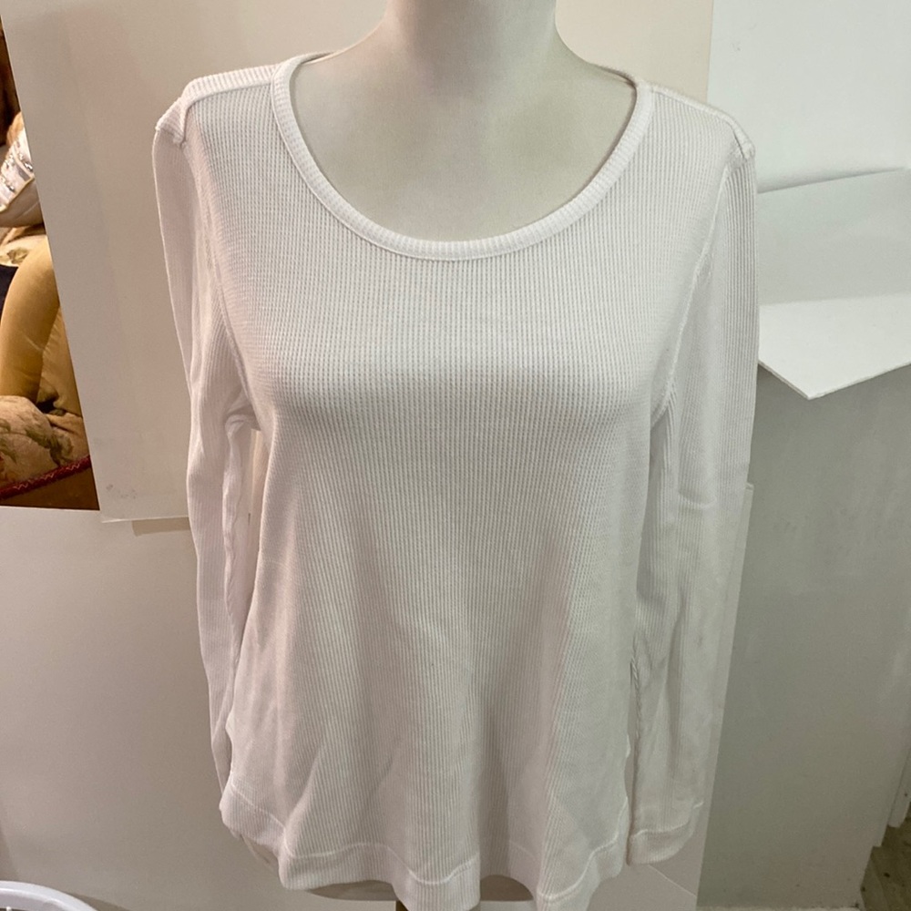 White thermal long sleeve no content material or size can fit a med or large new